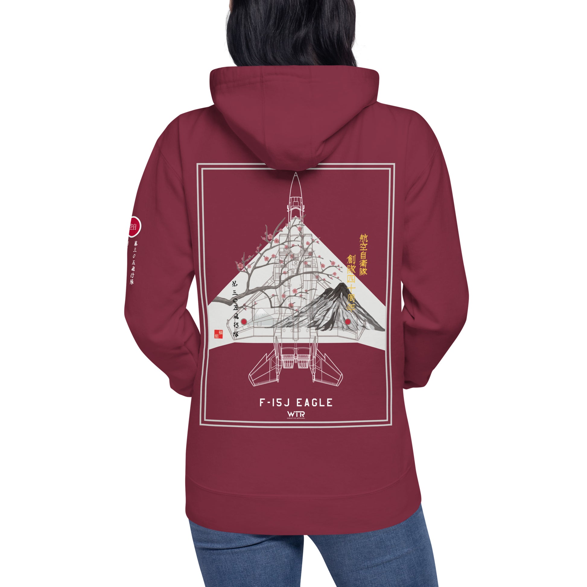 Hand-drawn schematic of the Mitsubishi F-15J Eagle 305th Tactical Fighter Squadron 50 Years Anniversary livery on a unisex hoodie.