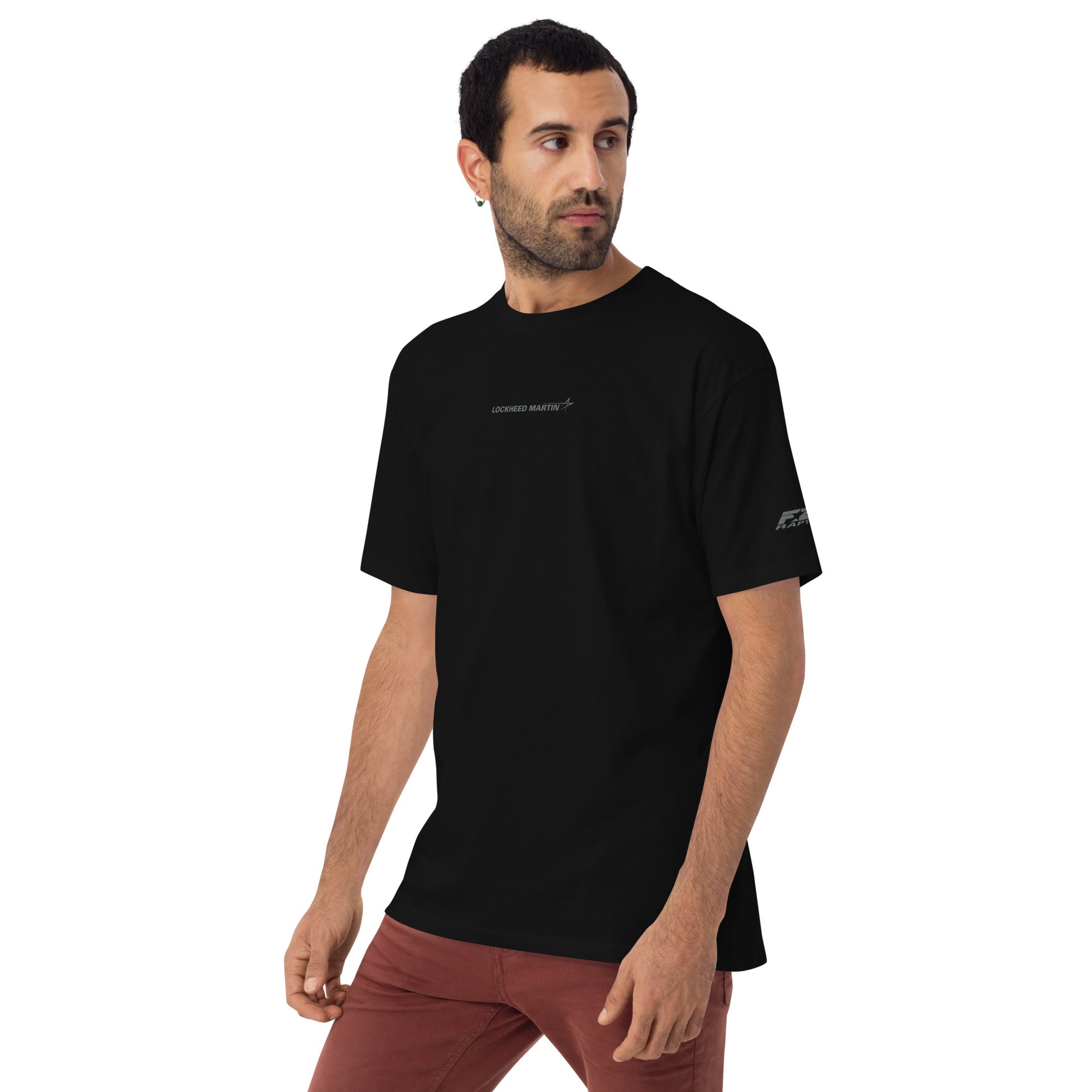 Hand-drawn schematic of the Lockheed Martin F-22 Raptor airframe and camouflage design printed on a premium t-shirt.