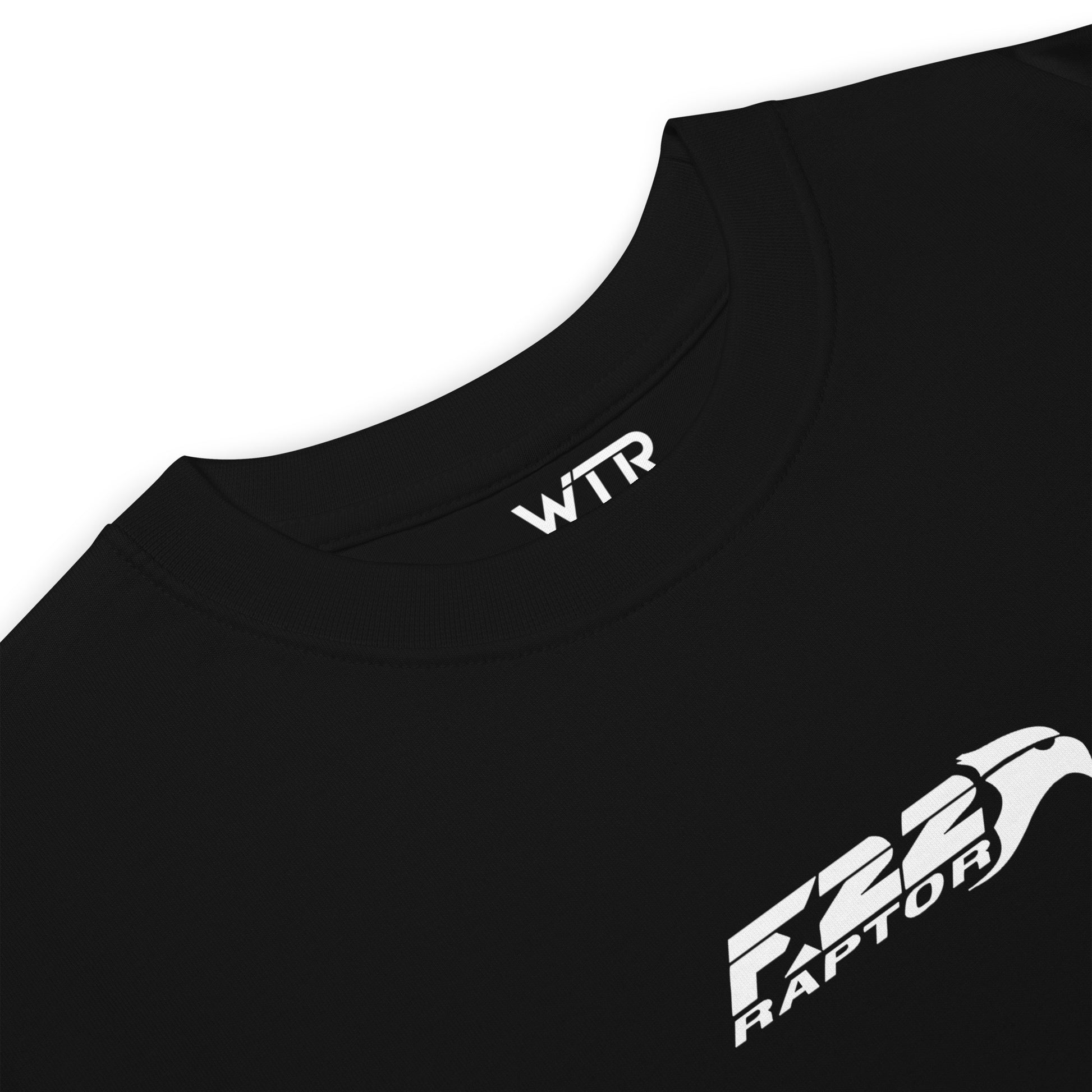 Hand-drawn technical study of the Lockheed Martin F-22 Raptor front canopy and nose section on a premium t-shirt.