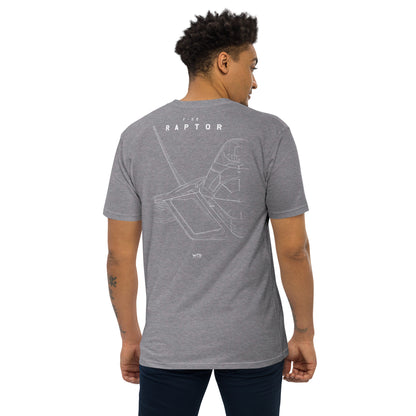 Hand-drawn technical study of the Lockheed Martin F-22 Raptor front canopy and nose section on a premium t-shirt.