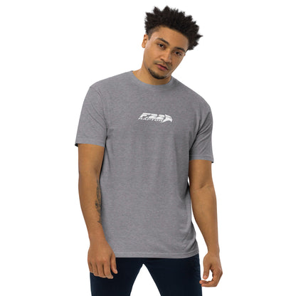 Hand-drawn technical study of the Lockheed Martin F-22 Raptor front canopy and nose section on a premium t-shirt.