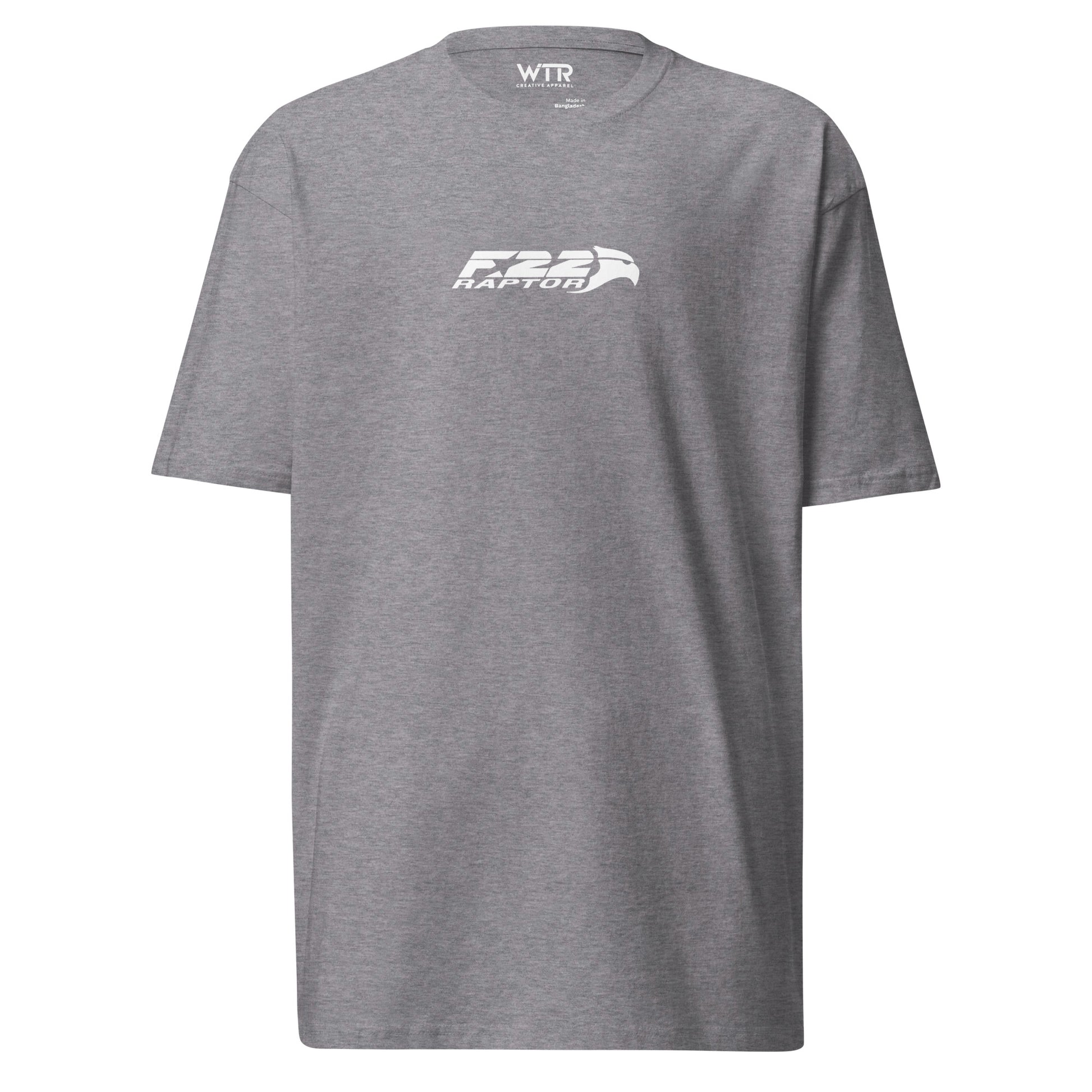Hand-drawn technical study of the Lockheed Martin F-22 Raptor front canopy and nose section on a premium t-shirt.