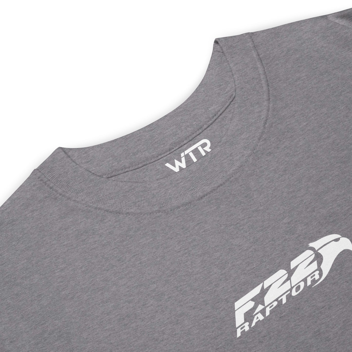 Hand-drawn technical study of the Lockheed Martin F-22 Raptor front canopy and nose section on a premium t-shirt.