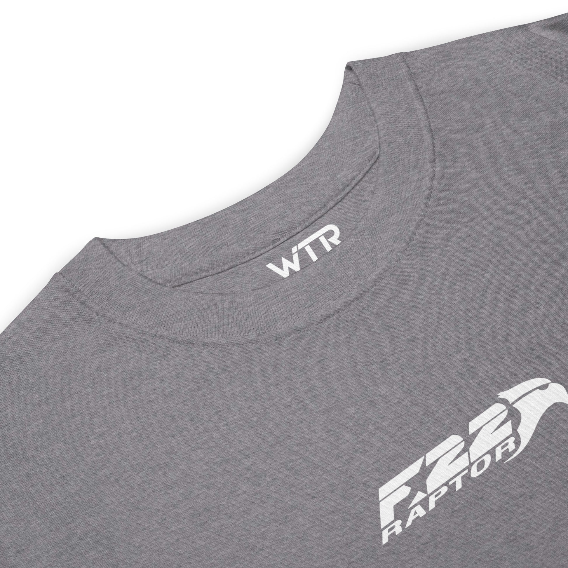 Hand-drawn technical study of the Lockheed Martin F-22 Raptor front canopy and nose section on a premium t-shirt.