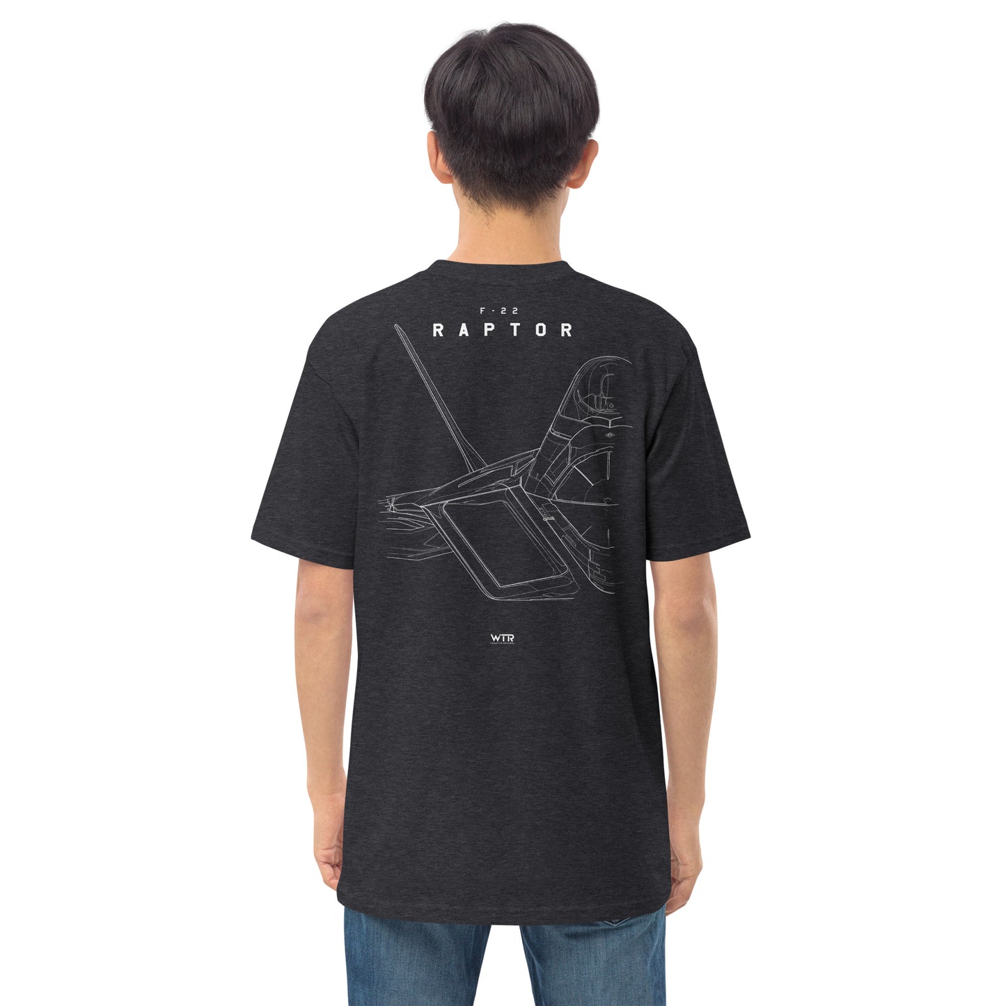 Hand-drawn technical study of the Lockheed Martin F-22 Raptor front canopy and nose section on a premium t-shirt.