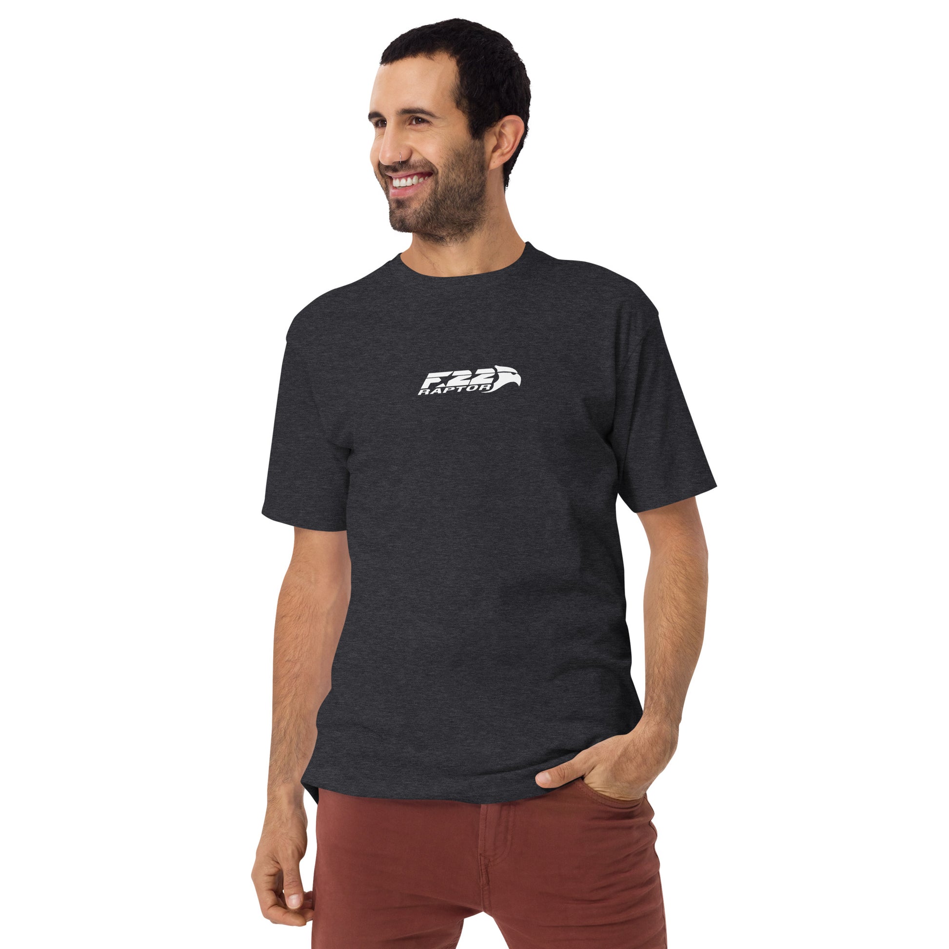 Hand-drawn technical study of the Lockheed Martin F-22 Raptor front canopy and nose section on a premium t-shirt.