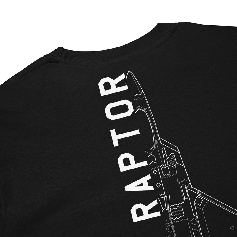 Hand-drawn technical schematic of the Lockheed Martin F-22 Raptor stealth fighter on a standard long-sleeve t-shirt.