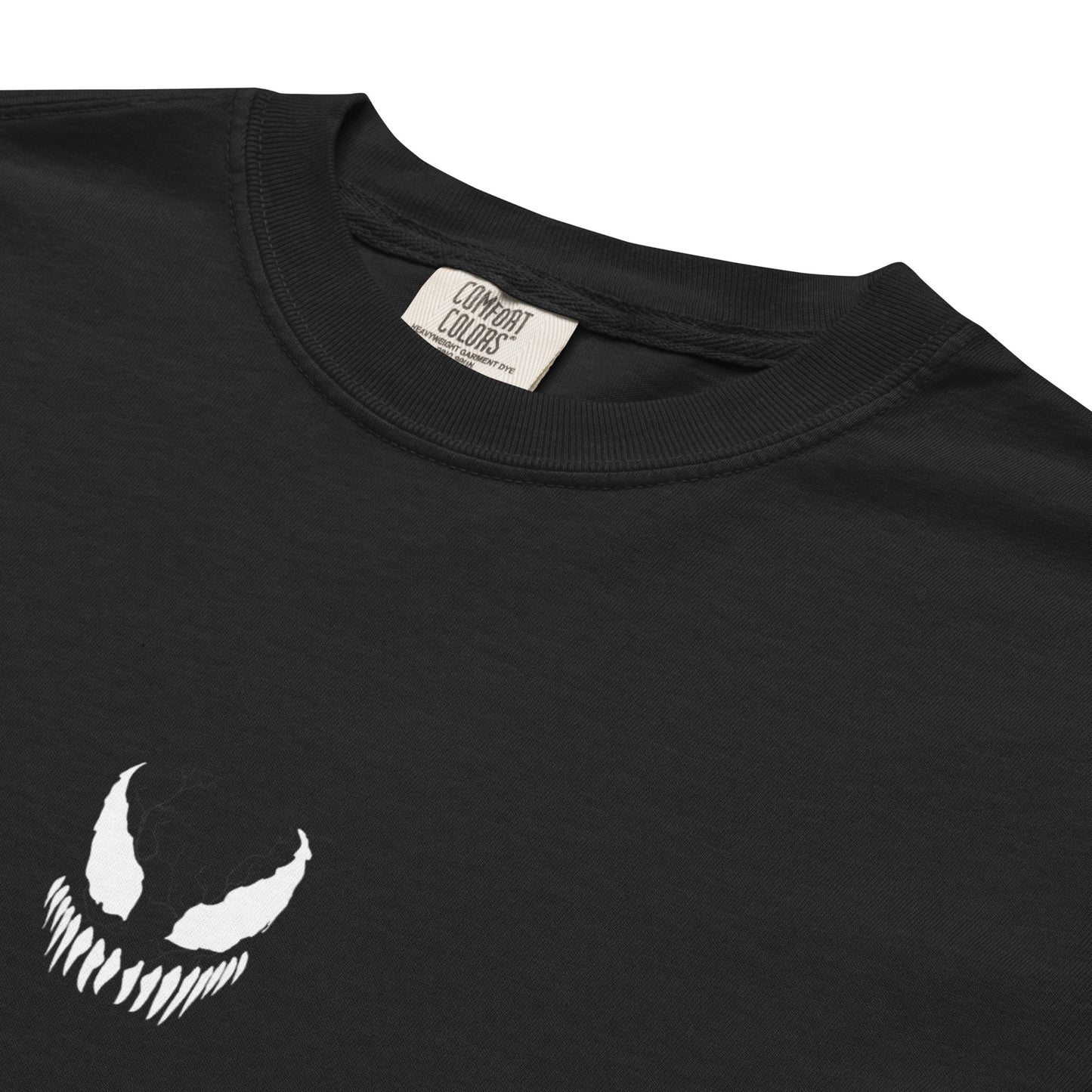 Hand-drawn technical profile of a Venom-inspired monster symbiote anti-hero design printed on a standard t-shirt.