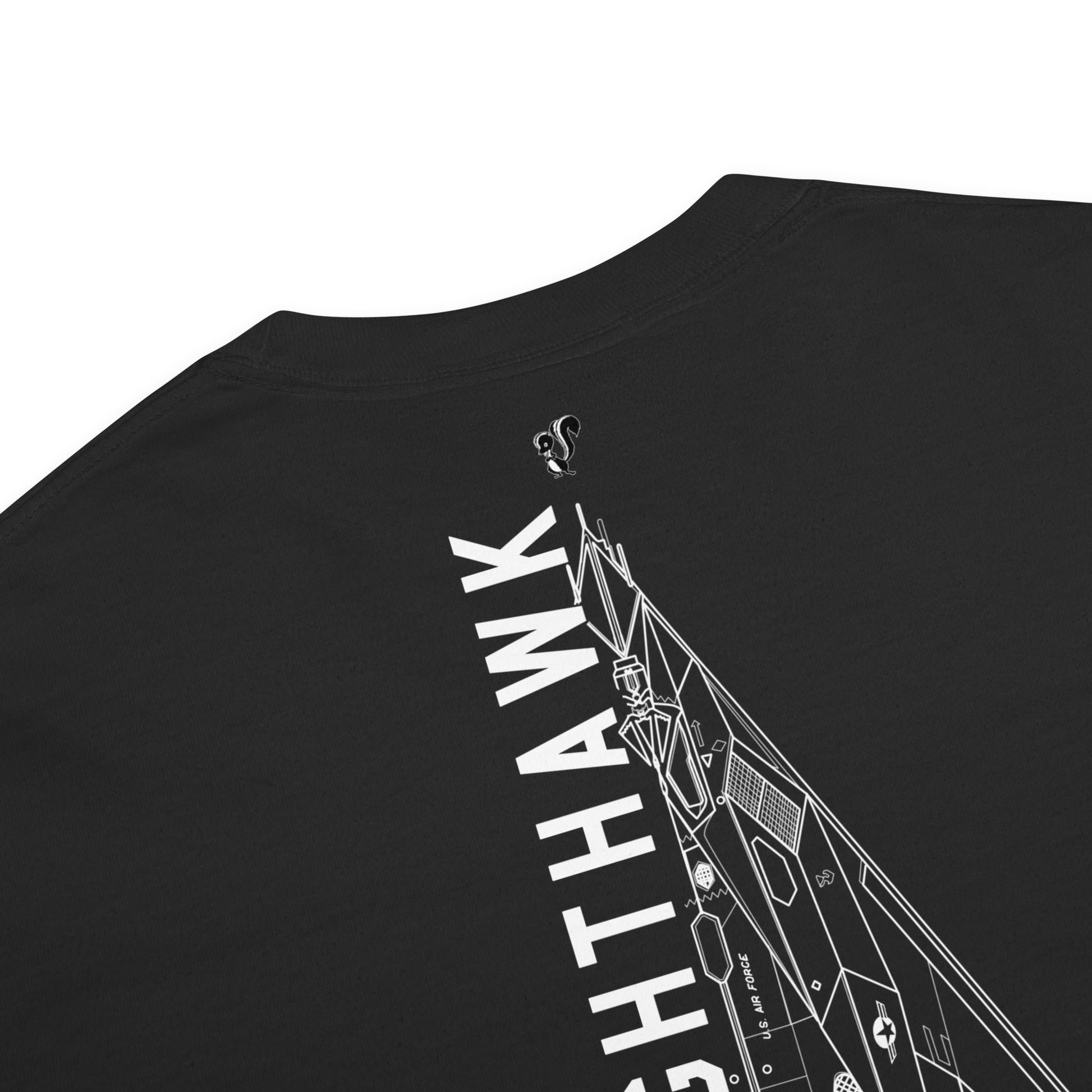 Hand-drawn schematic of the LOCKHEED MARTIN SKUNK WORKS F-117 NIGHTHAWK printed on a standard T-shirt.
