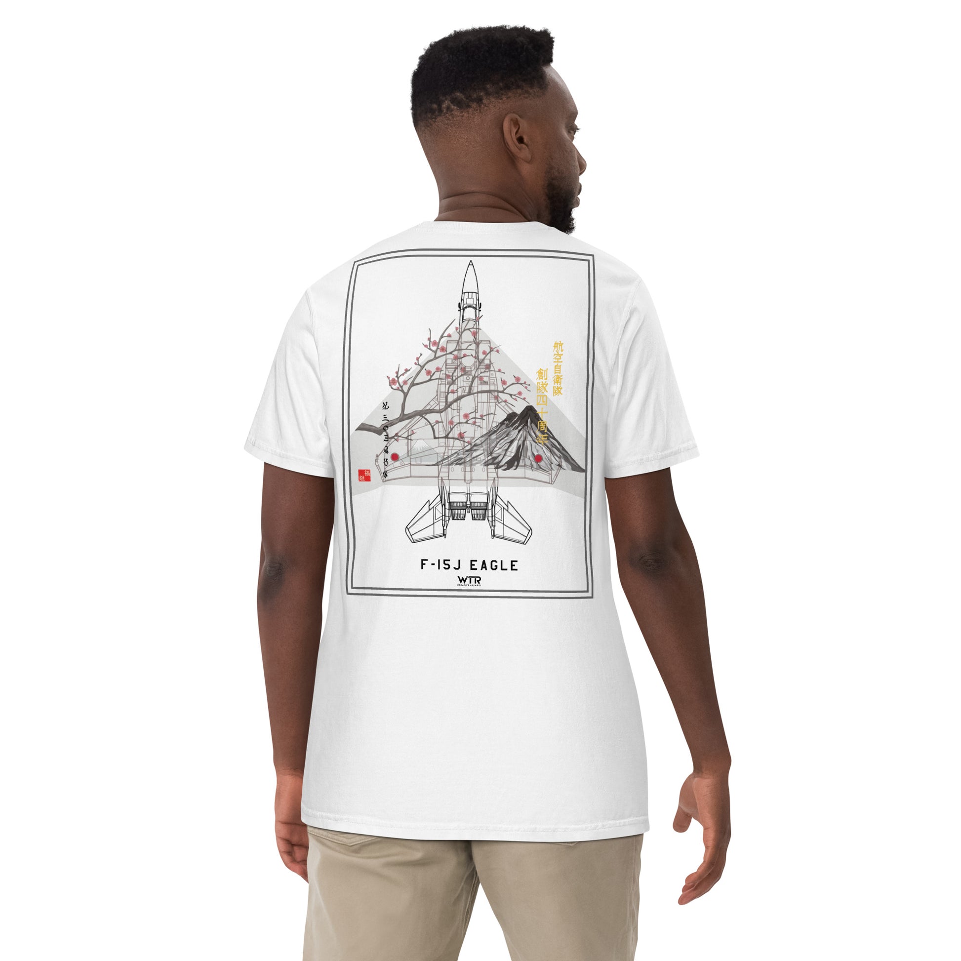 Hand-drawn schematic of the Mitsubishi F-15J Eagle 305th Tactical Fighter Squadron 50 Years livery on a standard t-shirt.