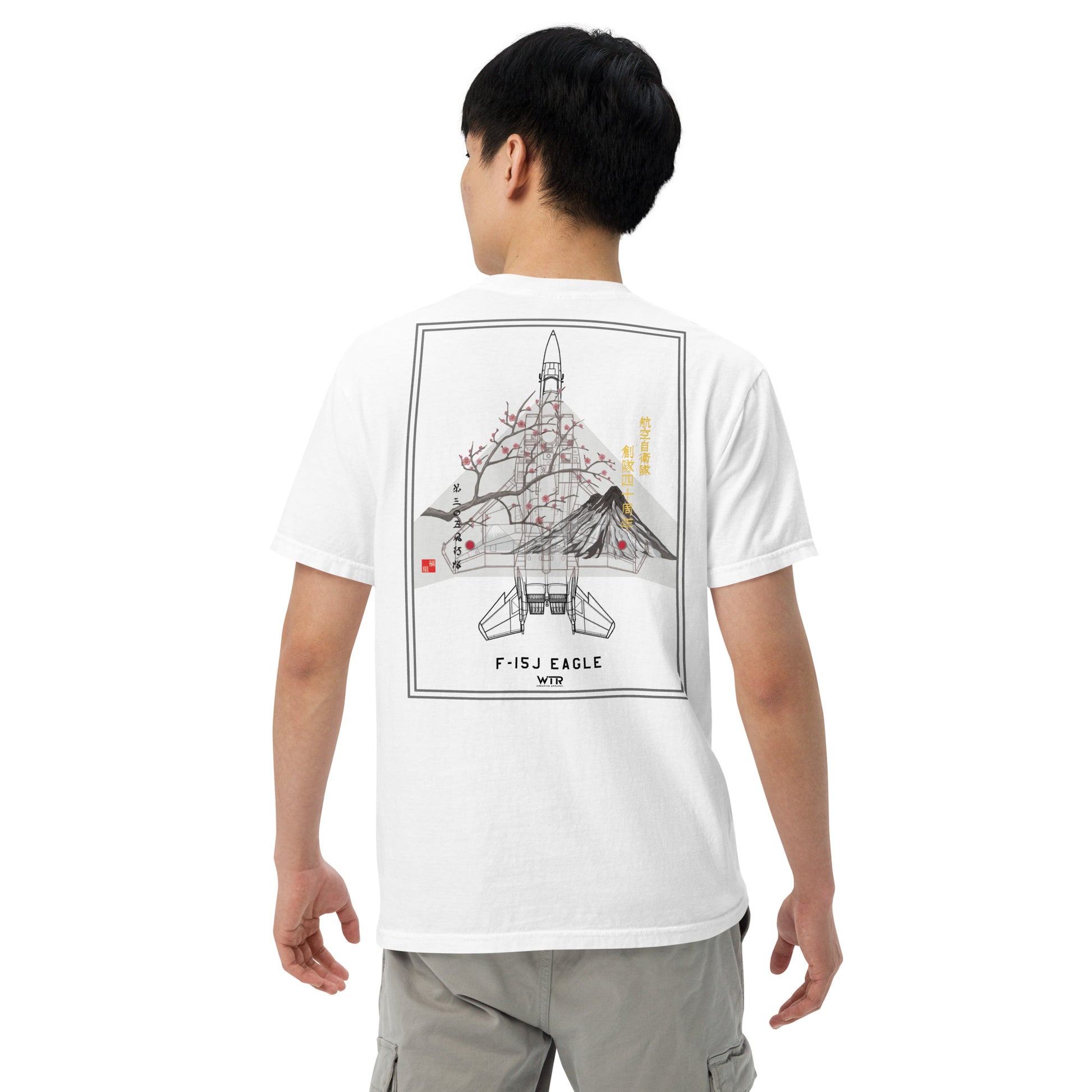 Hand-drawn schematic of the Mitsubishi F-15J Eagle 305th Tactical Fighter Squadron 50 Years livery on a standard t-shirt.