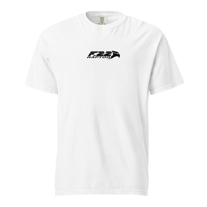 Hand-drawn technical study of the Lockheed Martin F-22 Raptor front canopy and nose section on a standard t-shirt.