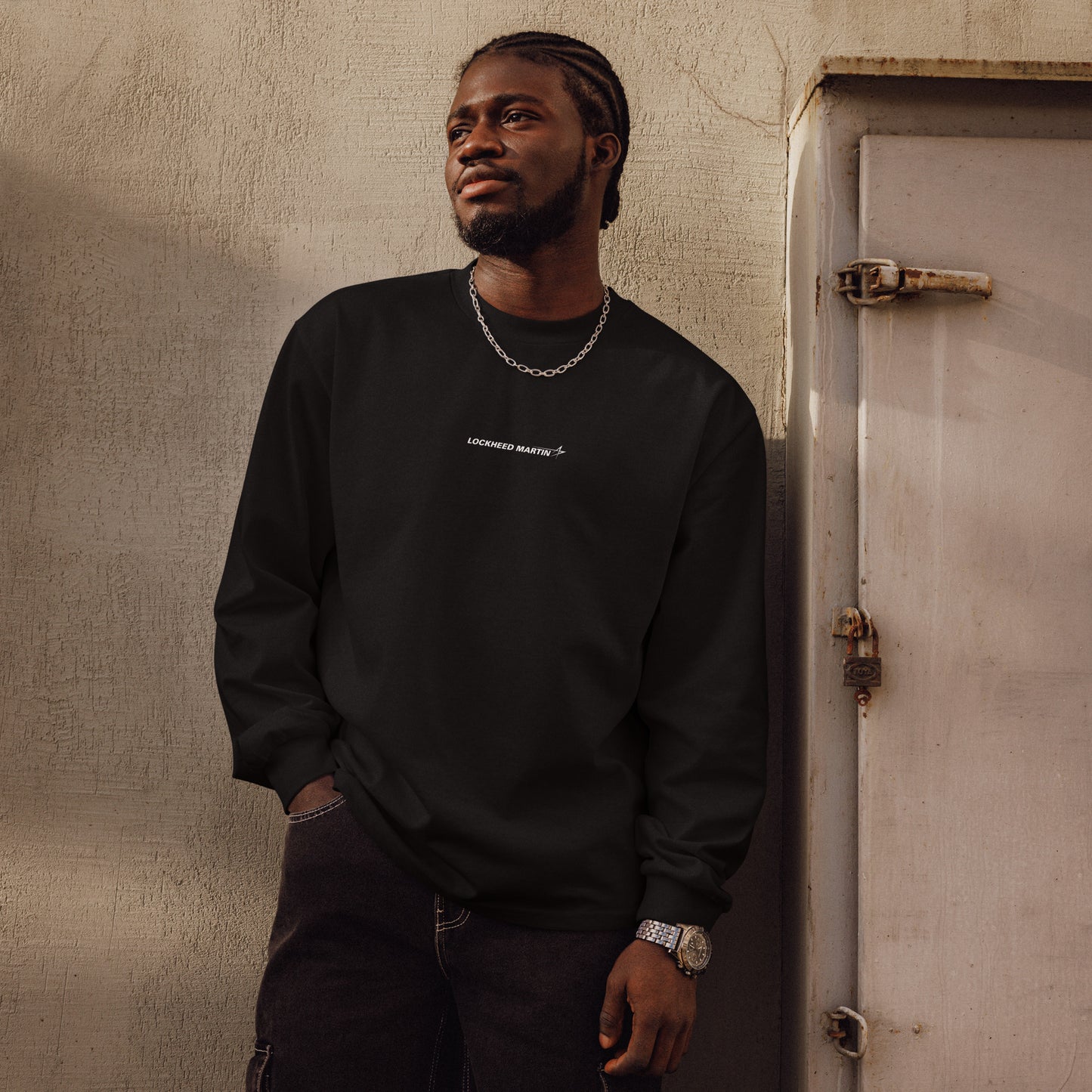 Hand-drawn schematic of the LOCKHEED MARTIN F-22 RAPTOR printed on a standard long sleeve T-shirt.